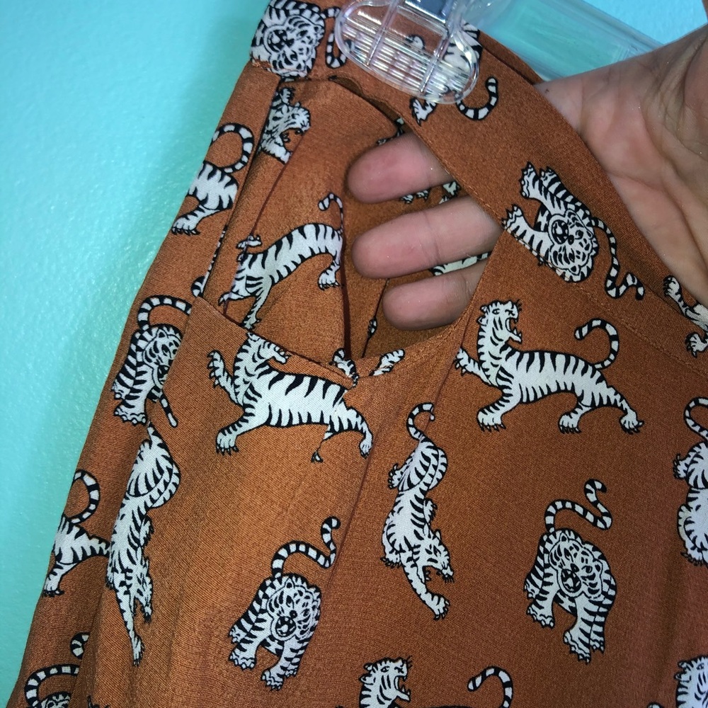 Hip cutout wide leg pants w/ tiger print